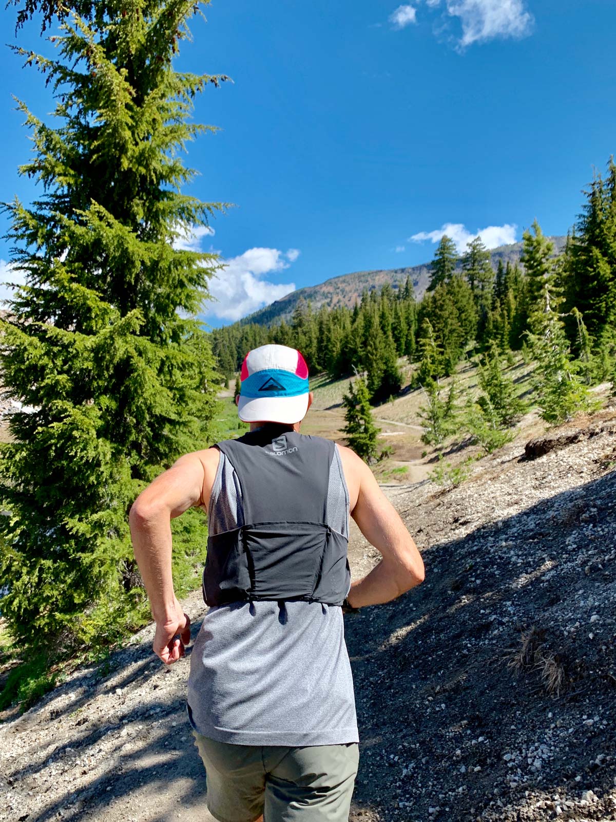 alastair running in Bend Oregon with Rokform Crystal Case in Hydration Vest pocket trail and kale