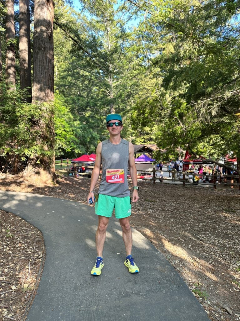 Alastair at the start of a trail race wearing Hoka Zinal 2 and Nike Second Sunrise short