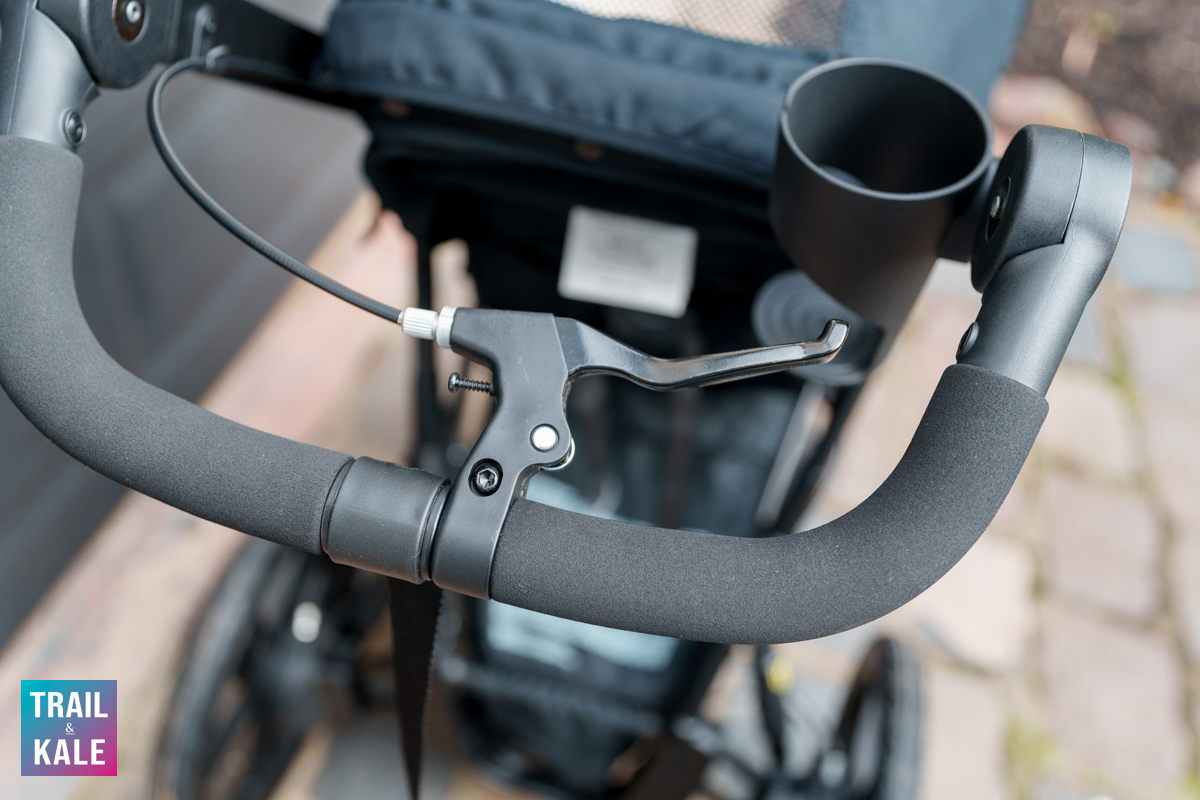 Bike-style handbrake and included cup holder on the Bob Wayfinder all-terrain jogging stroller