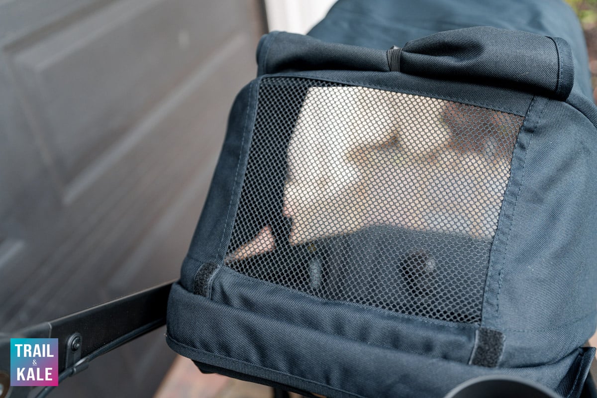 Large see-through mesh window on the Bob Wayfinder stroller allows you to keep an eye on your child while you're running or walking