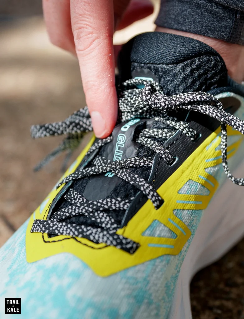 The Salomon Aero Glide 2 laces include a loop on the tongue that helps hold the tongue in place as you run