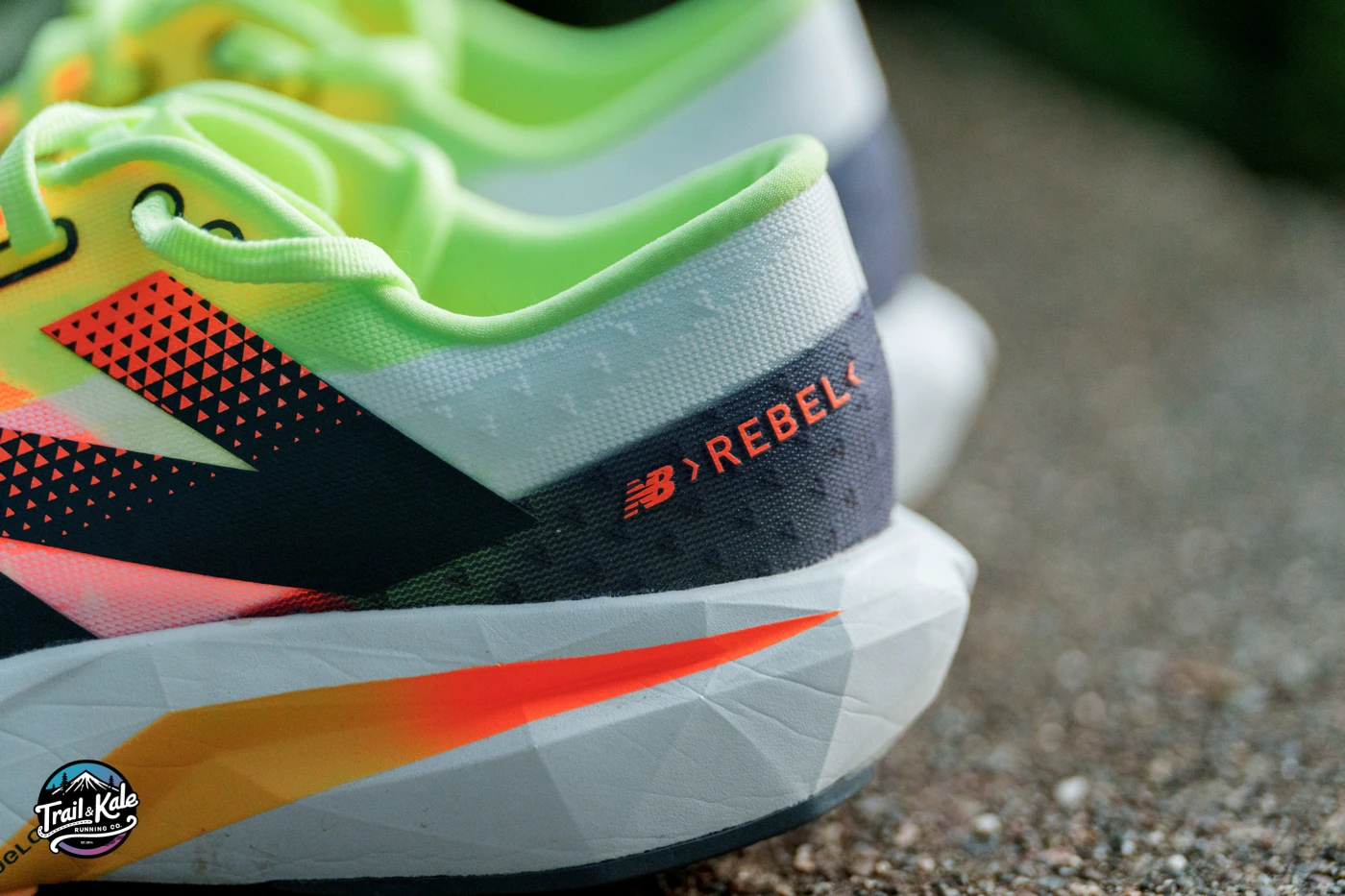 The heel counter and collar area of the NB FC Rebel v4 running shoe